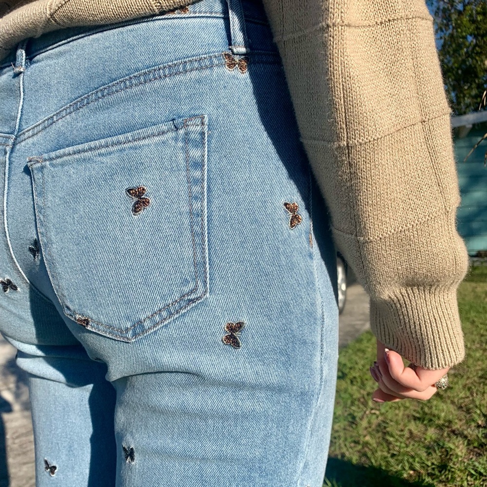 butterfly embroidered denim jeans
